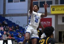 Following viral sensation, point guard Chase Adams fosters spirit at SLCC Chase Adams attempts a layup