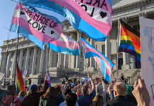 Utahns gather at state Capitol to protest transgender sports ban Transgender pride flags read "Families are made of love"