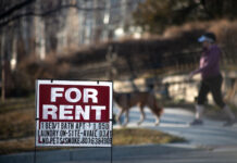 Utah renters face tough decisions as housing prices spike Person walks their dog behind a "For Rent" sign in the Avenues