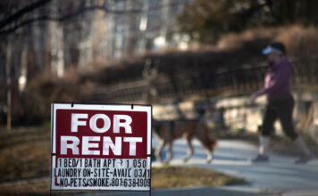 Utah renters face tough decisions as housing prices spike Person walks their dog behind a "For Rent" sign in the Avenues
