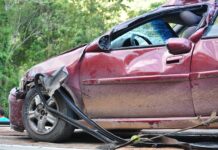 Lowest legal blood-alcohol limit in the nation produces mixed results A red sedan with substantial crash damage