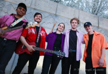 SLCC holds first Battle of the Bands competition in 8 years Five musicians smiling for a picture