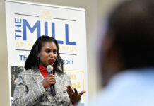 Congolese students become first all-refugee graduating class of SLCC entrepreneur program Bennett Muhoza presenting her business idea on graduation day