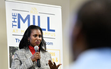 Congolese students become first all-refugee graduating class of SLCC entrepreneur program Bennett Muhoza presenting her business idea on graduation day