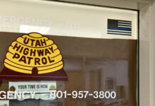 Thin Blue Line flag disappears from UHP office window at South City Campus Sticker on upper right corner of UHP window