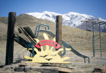 Pacific Islanders celebrate cultural heritage at Iosepa memorial Sun-shaped Iosepa sign in front of playground