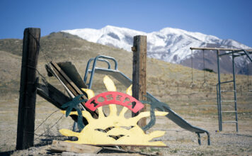 Pacific Islanders celebrate cultural heritage at Iosepa memorial Sun-shaped Iosepa sign in front of playground