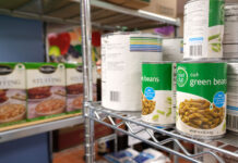 SLCC community has access to free food through Bruin Pantry Canned and boxed food on metal pantry shelves