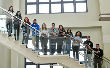 Bruin Scholars program helps students transition to SLCC 11 students stand on a stairway