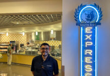 South City bodega reopens after lengthy closure, introduces self-checkout Joe Martinez smiles for a photo next to South Side Express sign