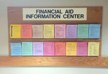 Without an exact date, the student debt relief application is set to arrive in October Financial aid information center board with fliers of various colors