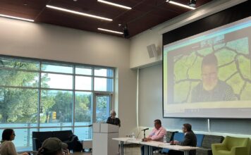 Former chair of the Northwestern Shoshone Nation details Salt Lake’s historical significance Two audience members, seated left, listen to panel discussion