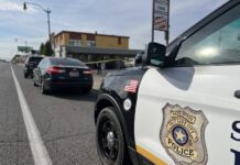 Police investigating shooting near South City Campus Side view of Salt Lake City police vehicles