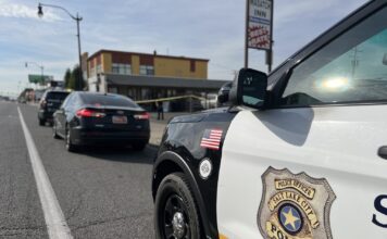 Police investigating shooting near South City Campus Side view of Salt Lake City police vehicles