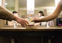 SLCC offers free menstrual products. Here’s how students can access them A woman passes a menstrual product to another