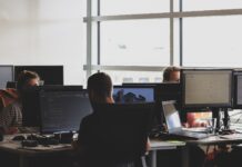 New phenomenon of ‘quiet quitting’ garners attention on social media People sitting on chairs in front of computer monitors