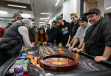 Photos: SLCCSA Casino Night Several people playing a game of roulette