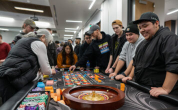 Photos: SLCCSA Casino Night Several people playing a game of roulette