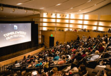 2023 Tumbleweeds film fest arrives in West Jordan on April 22 Crowd seated in auditorium for Tumbleweeds Film Festival