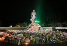 Gun violence prevention is not a fantasy – it’s an achievable reality Flowers surround a standing memorial to honor victims of the mass shooting at MSU on Feb. 13