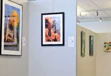 Women take back their identity in new SLCC art exhibit Gallery partition displaying artwork by Nancy Strahinic in foreground