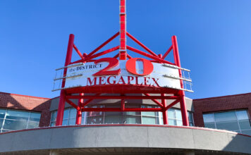 Students and staff can take a break this summer with free movie tickets Facade for Megaplex 20 at The District