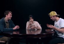 What’s Bruin’ – Hot Wing Challenge Eli Hansen, Asia Soth, and Eric Drubbing seated at a table