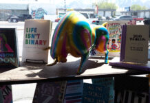 Utah’s indie bookstores are leading the charge against school book bans Rainbow-colored bull surrounded by LGBTQ-themed books