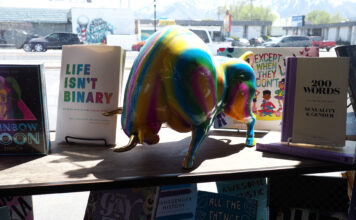 Utah’s indie bookstores are leading the charge against school book bans Rainbow-colored bull surrounded by LGBTQ-themed books