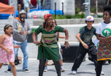 Juneteenth arrives this Monday. Here are some upcoming celebrations open to all. Adults and children dancing in a courtyard
