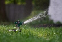 Salt Lake City residents can now easily track their water use An Impact sprinkler watering a green lawn