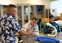 Dual language: An option for the Spanish-speaking community at SLCC Emmanuel Santa-Martinez teaching biology concept to two students
