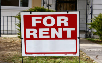 Rising rent costs put a strain on SLCC students Red and white "For Rent" sign standing in front yard of a residence