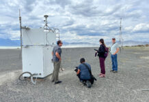 Great Salt Lake Collaborative wins journalism partnership award Group of media members working with equipment on a lake bed