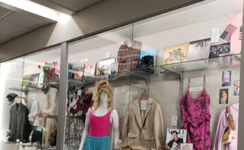 Fashion Institute open house presents an array of style, fashion Vintage clothing and other items inside a clear display case