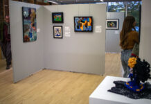 New ‘La Mortalidad’ exhibit focuses on life and its end Multiple art pieces hanging in a gallery