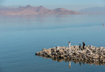The way to save the Great Salt Lake? Limit new development of all types, poll says Three people standing on a rock inlet near Great Salt Lake