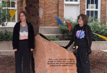 SLCC celebrates Transgender Day of Remembrance with unveiling of stone monument Two students standing beside a stone monument in South City Campus courtyard