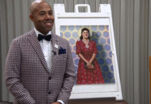 SLCC event remembers Henrietta Lacks, tells the importance of owning one’s story Dr. Richard Ferguson poses in front of a photo of Henrietta Lacks