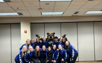 The SLCC Dance-SLC Stars co-op officially tips off in 2024 SLCC Dance Company pose for a group photo with Buster Bear