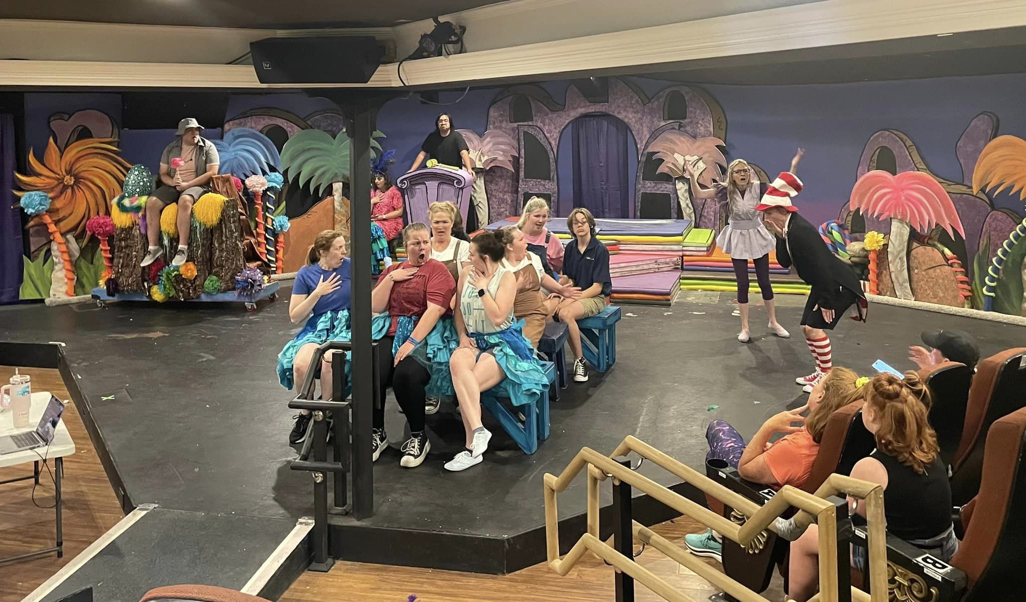 Group of actors rehearse a scene