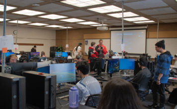 Esports competitors test their skills during event at SLCC Redwood campus Multiple esports teams playing a video game in a classroom computer lab