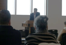 SLCC holds public meetings in search for next president Audience, in foreground, listens to Brady Southwick speak
