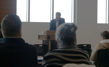 SLCC holds public meetings in search for next president Audience, in foreground, listens to Brady Southwick speak