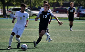 Sports recap: SLCC men’s soccer won regional but fell short of NJCAA title Two opposing soccer players compete for control of the ball