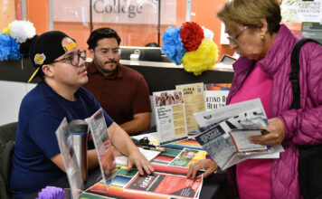 ‘UndocuMonth’ returns to SLCC in April with 5 events Latina woman inquiring about community resources