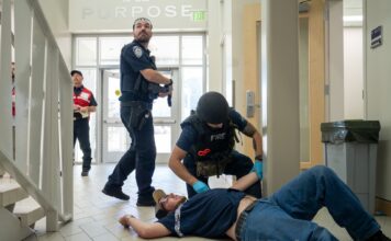 How Utah’s colleges are preparing for an active shooter Active shooter drill - fire and police personnel aiding a victim