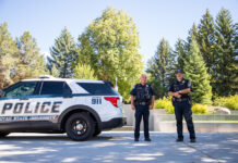 From an active shooter to severe weather, USU Aggie Alert tries to keep students safe and informed Two campus police officers standing outside