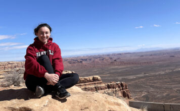 #SLCCVotes: Meet Diana Mavlanova, candidate for SLCCSA vice president for academic pathways Diana Mavlanova sitting on a rock formation above the skyline