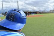 Bruins baseball back in the swing of things as they eye JUCO World Series Salt Lake catcher wearing helmet backward in foreground, baseball field in background